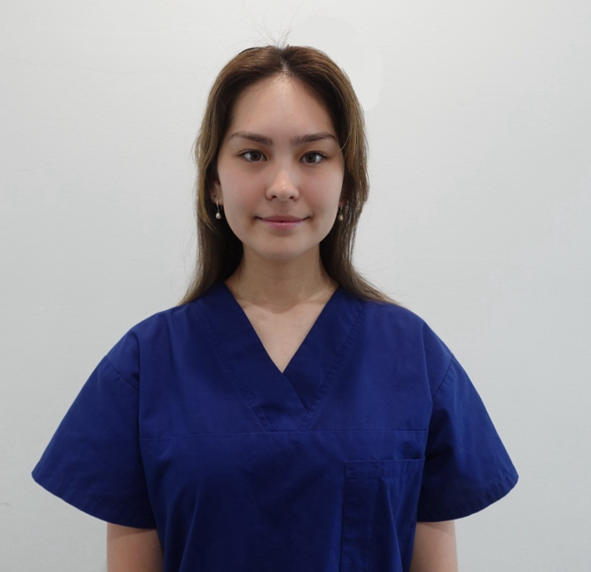 A member of the Pristine Smiles dental team